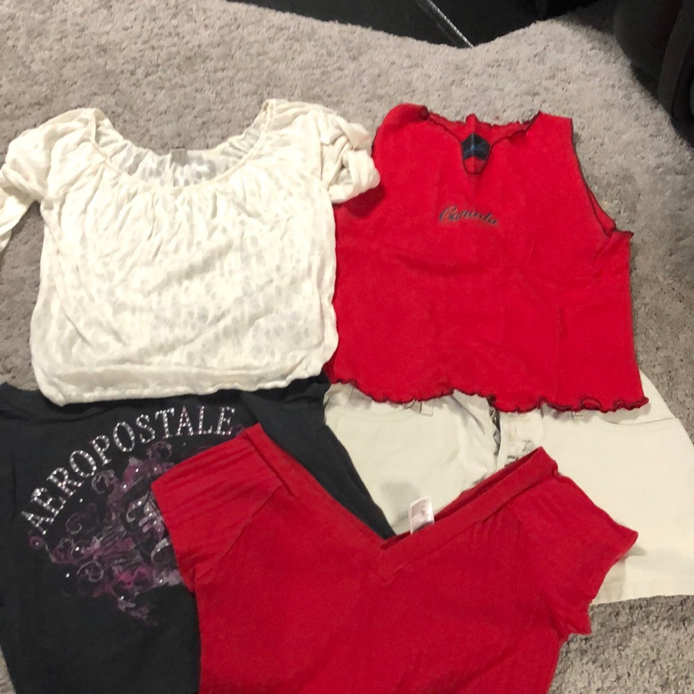 Four shirts and one pair of shorts